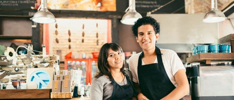 two Hispanic business owners